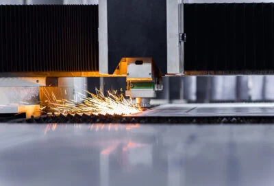 Close Up Of Laser Cutting With A Fiber Laser Cutter Close Up Of Laser Cutting With A Fiber Laser Cutter